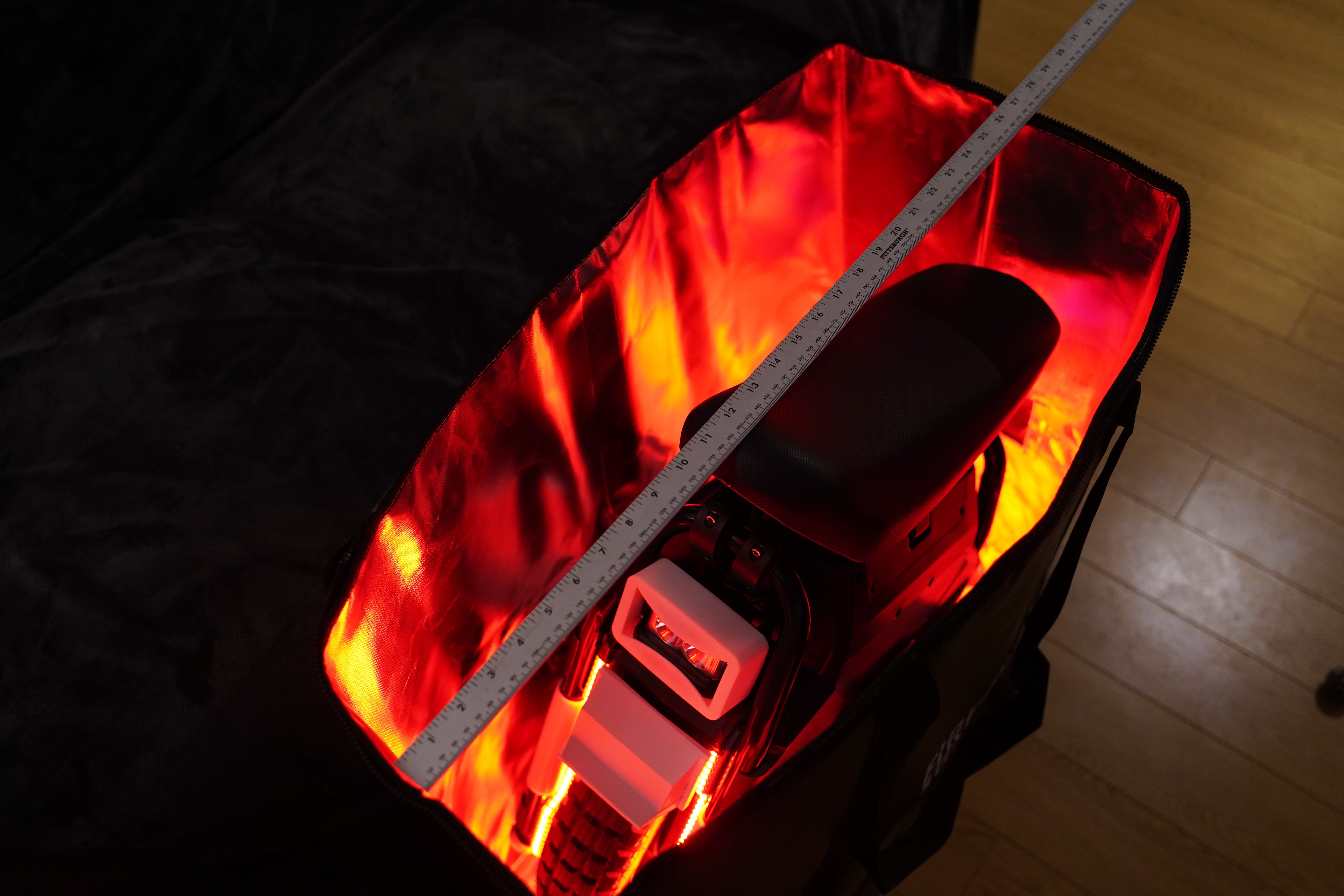 Electric Unicycle Inside Of A Large Fire Resistant Bag