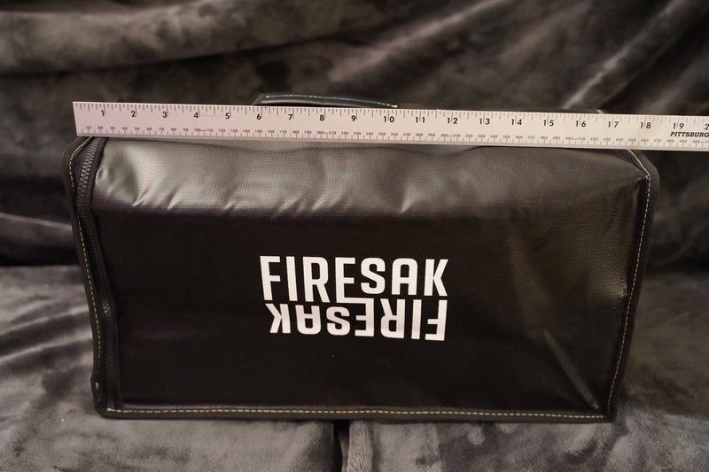 FireSak Go bag measuring 18" with a ruler